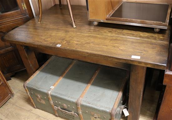An oak rustic dining table W.140cm